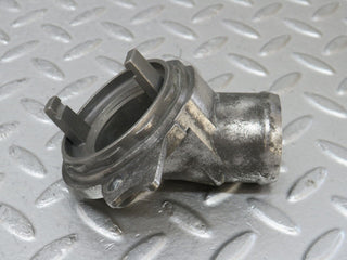 W210 thermostat housing used OEM