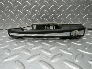 W124 front left exterior door handle used OEM