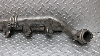 W126 Coupe exhaust manifold left side used OEM