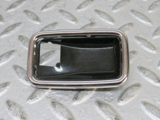 W123 chrome frame for door opener right used OEM