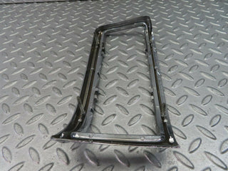 W115 tail light chrome frame left used OEM