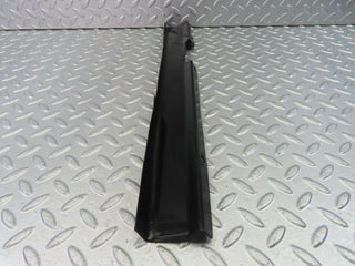 W123 cable channel cover front left used OEM