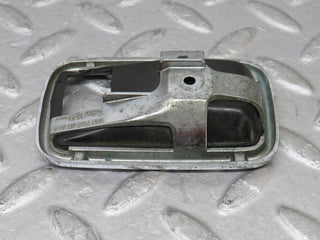W108 chrome frame for door opener left used OEM