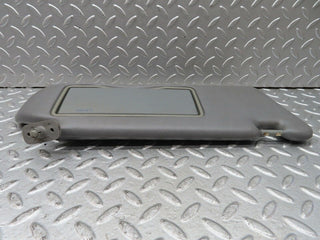 C140 sun visor right side grey used OEM