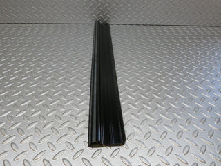 W123 front left door sill trim black used OEM
