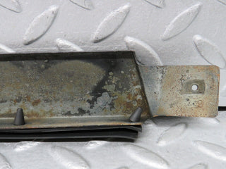 W124 Cabriolet under headlight trim left used OEM