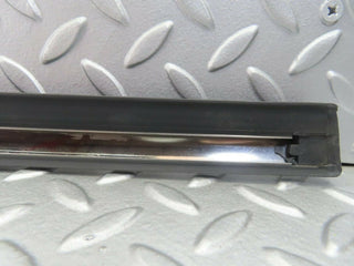 W123 front left door lower trim new OEM