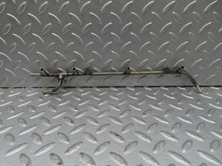 W108 fuel injector pipe left side used OEM