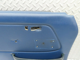 W123 front left door card blue used OEM