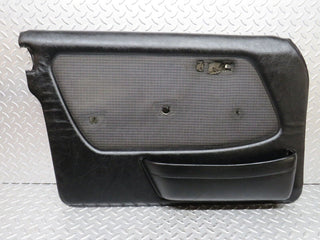 W123 Wagon front left door card black used OEM