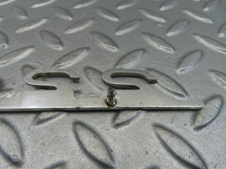 W115 rear trunk badge emblem used OEM