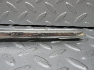 W108 rear right door chrome window channel used OEM