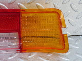 W109 tail light lens left side used OEM