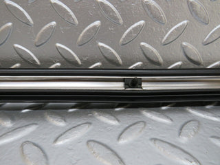 W123 front right door lower moulding trim used OEM