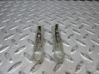 W124 Coupe number plate light pair used OEM