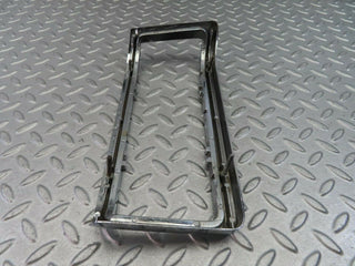 W115 tail light chrome frame left used OEM