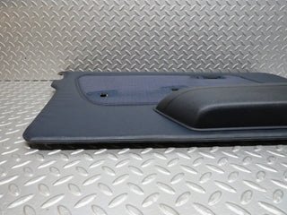 W123 front left door card blue used OEM