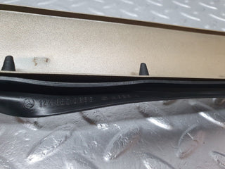 W124 under headlight trim left side used OEM