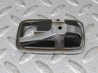 W108 chrome frame for door opener left used OEM