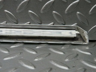 R107 SLC left door chrome trim used OEM