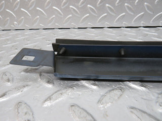 W124 Wagon under headlight trim left used OEM