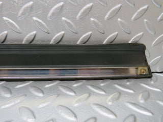 W201 Baby Benz rear left door lower moulding trim used OEM