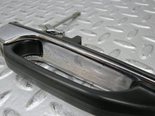 W123 front left exterior door handle used OEM