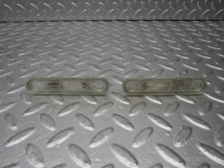W124 rear license plate light used OEM