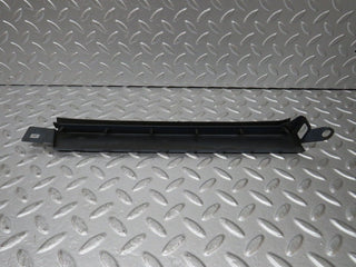 W124 Wagon under headlight trim left used OEM