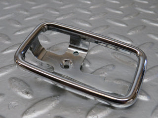 W123 door handle surround left used OEM