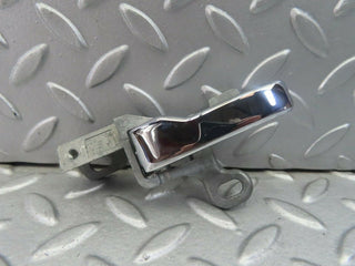 W123 left interior door handle used OEM