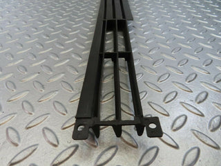 W115 front lower grill left used OEM