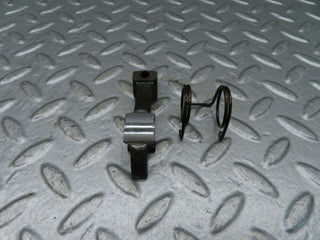 W123 valve rocker arm with retaining spring used OEM