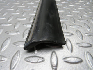 W123 front left door lower moulding trim used OEM