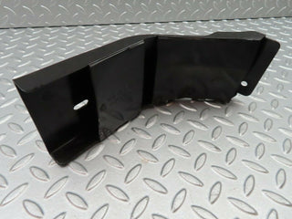 W124 front left wiring cover used OEM