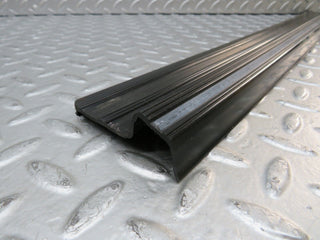 W123 front left door sill trim black used OEM