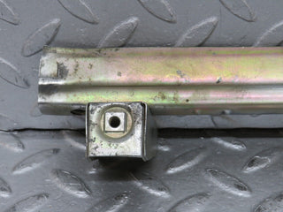 W109 rear left door window channel used OEM