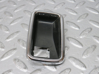 W123 chrome frame for door opener right used OEM
