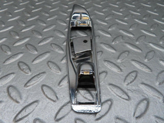 R107 SLC interior door handle chrome surround left used OEM