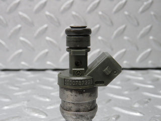 W124 Cabriolet fuel injector used OEM