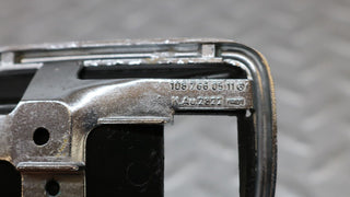 W109 chrome frame for door opener left used OEM