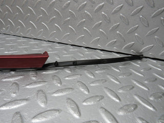 R129 SL left headlight lower trim used OEM