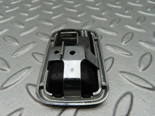 W123 chrome frame for door opener right used OEM