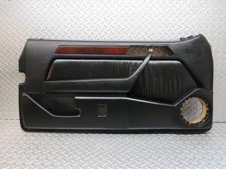 W124 Cabriolet left door card black used OEM