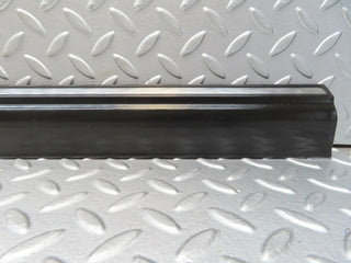 W123 front left door lower trim used OEM