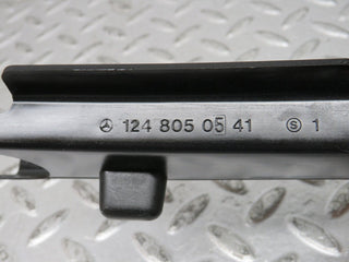 W124 trunk lid lock control rod cover used OEM