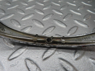 W111 headlight chrome frame used OEM