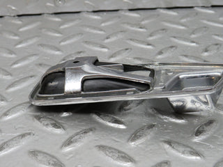 W123 chrome frame for door opener right used OEM