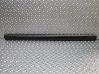 W123 front left door lower moulding trim used OEM