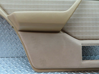 W124 rear left door card beige used OEM